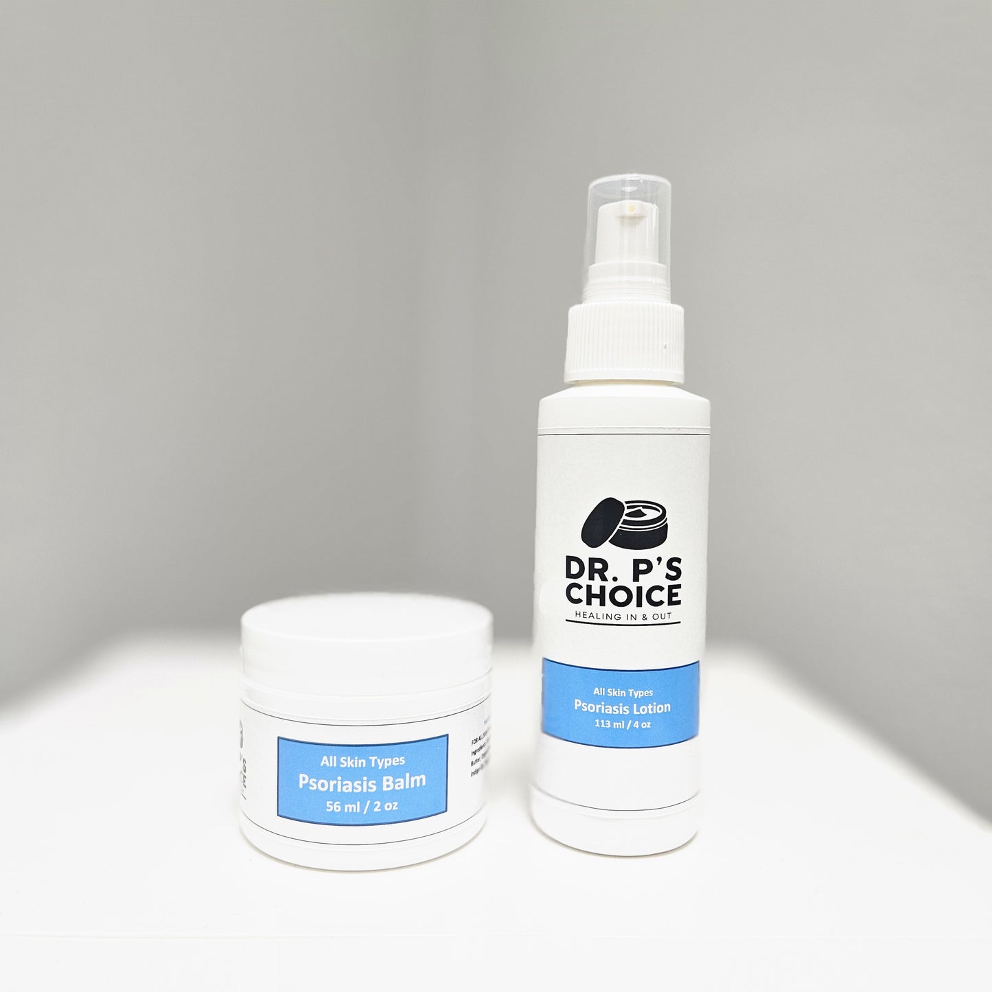 A skin care product bottle positioned on a pristine white surface, showcasing its modern packaging and aesthetic appeal.