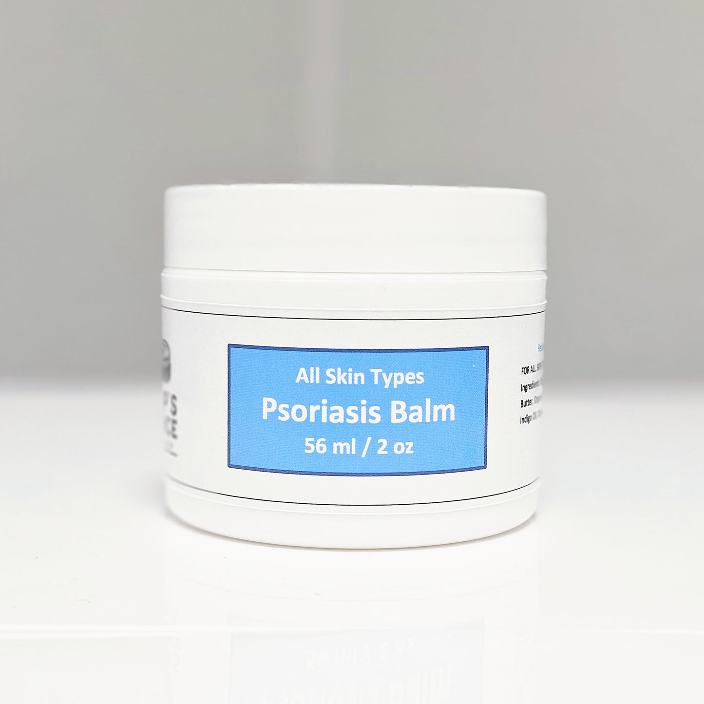 A soothing balm suitable for all skin types, promoting hydration and nourishment for healthy, radiant skin.