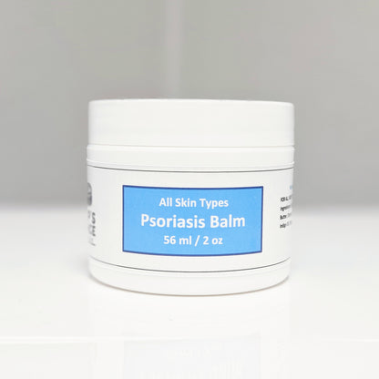 A soothing balm suitable for all skin types, promoting hydration and nourishment for healthy, radiant skin.