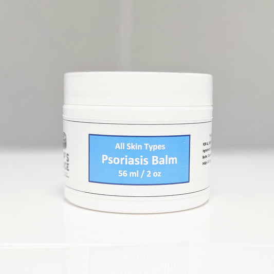 A soothing balm suitable for all skin types, promoting hydration and nourishment for healthy, radiant skin.